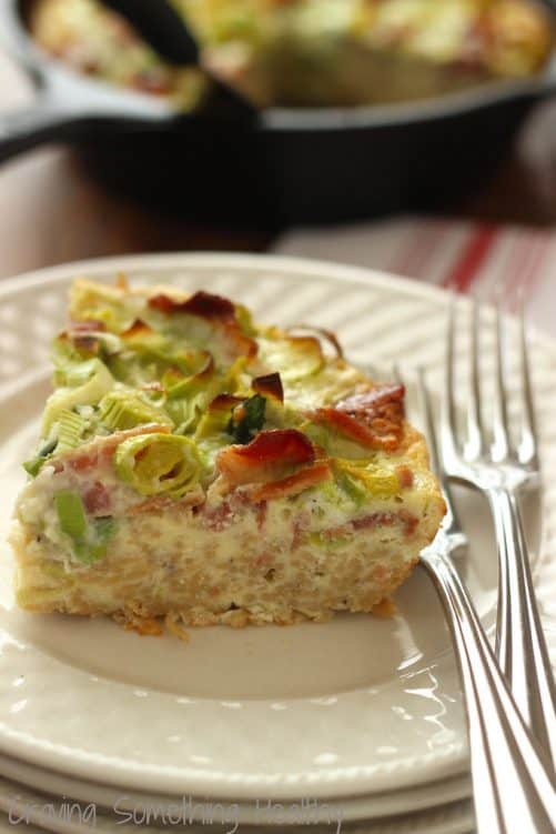 A close up shot of a slice of breakfast pasta carbonara frittata