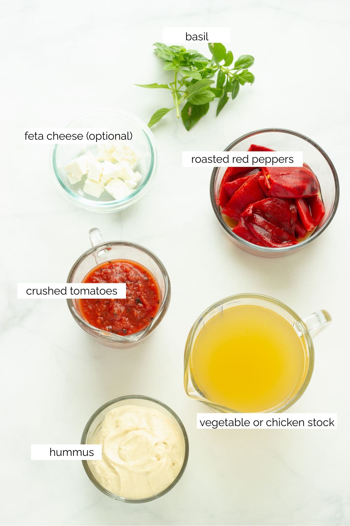 Ingredients needed to make roasted red pepper and tomato soup.