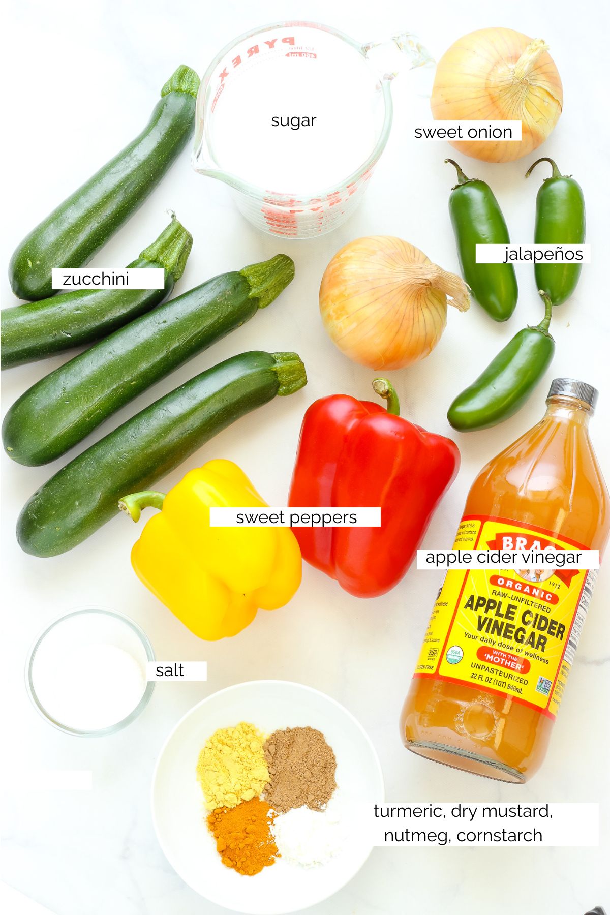Ingredients needed to make zucchini relish.