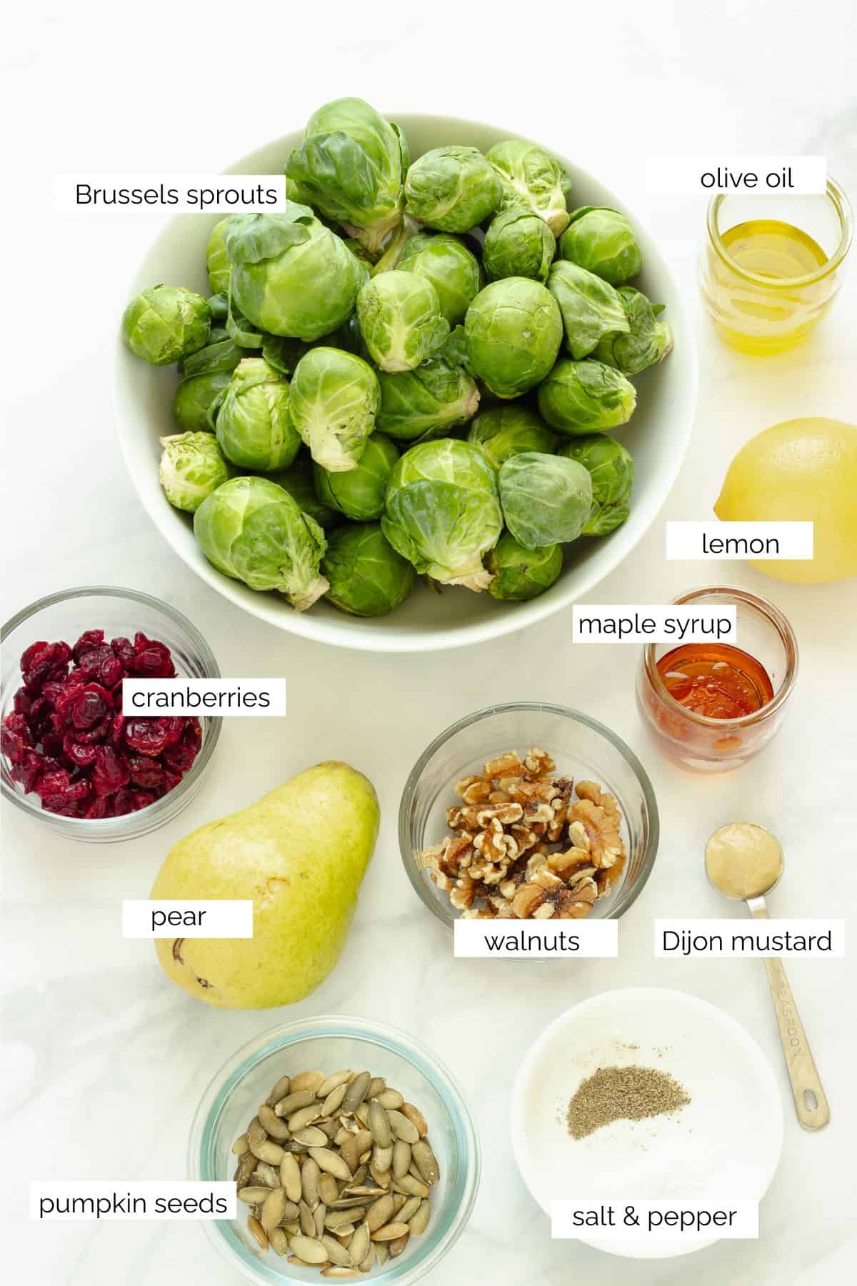 Ingredients needed to make a shaved Brussels sprouts salad.