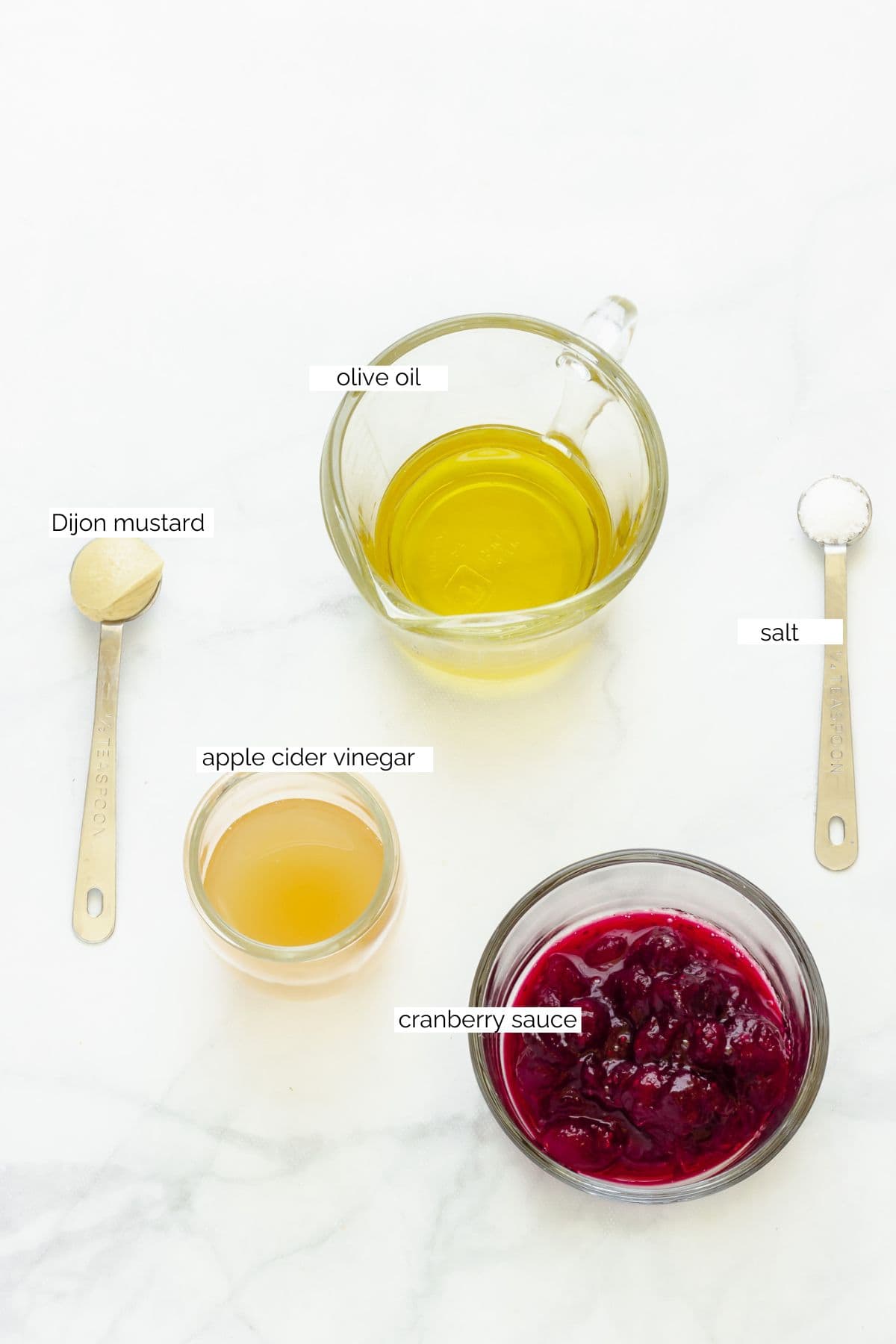 Ingredients needed to make cranberry vinaigrette.