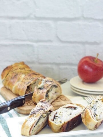 Homemade stuffed bread with ham, cheddar cheese and apples