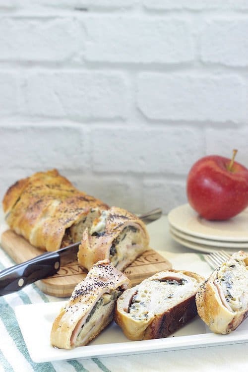 Homemade stuffed bread with ham, cheddar cheese and apples