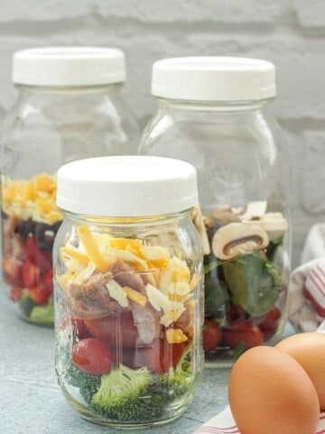mason jars with chopped vegetables for omelets