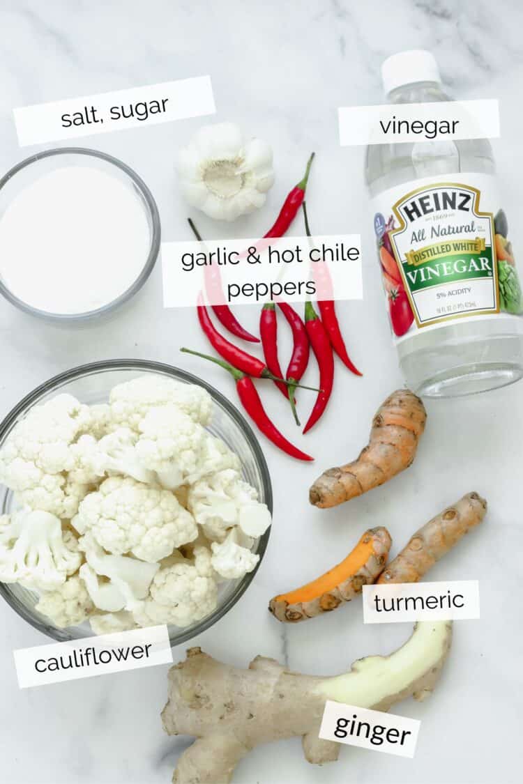 overhead shot of ingredients needed to make pickled cauliflower with turmeric & ginger.
