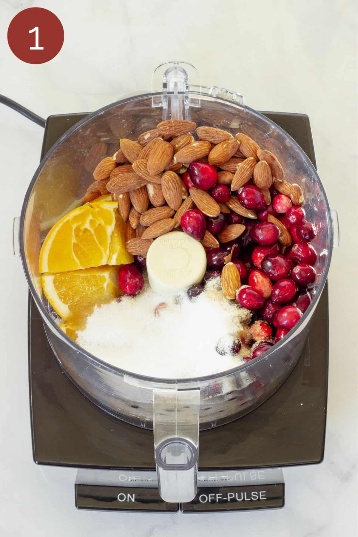 Step one to make low sugar cranberry orange relish. Ingredients in the food processor.