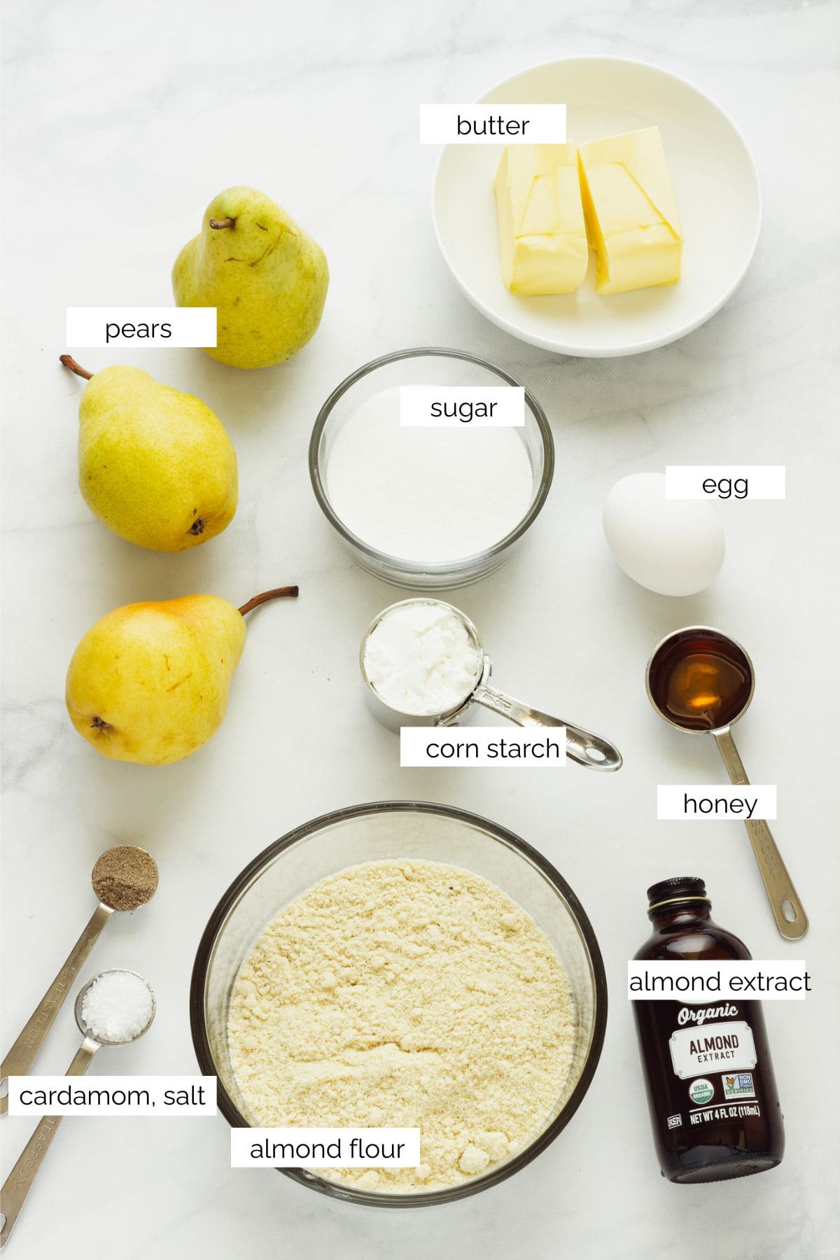 Ingredients needed to make a pear tart.