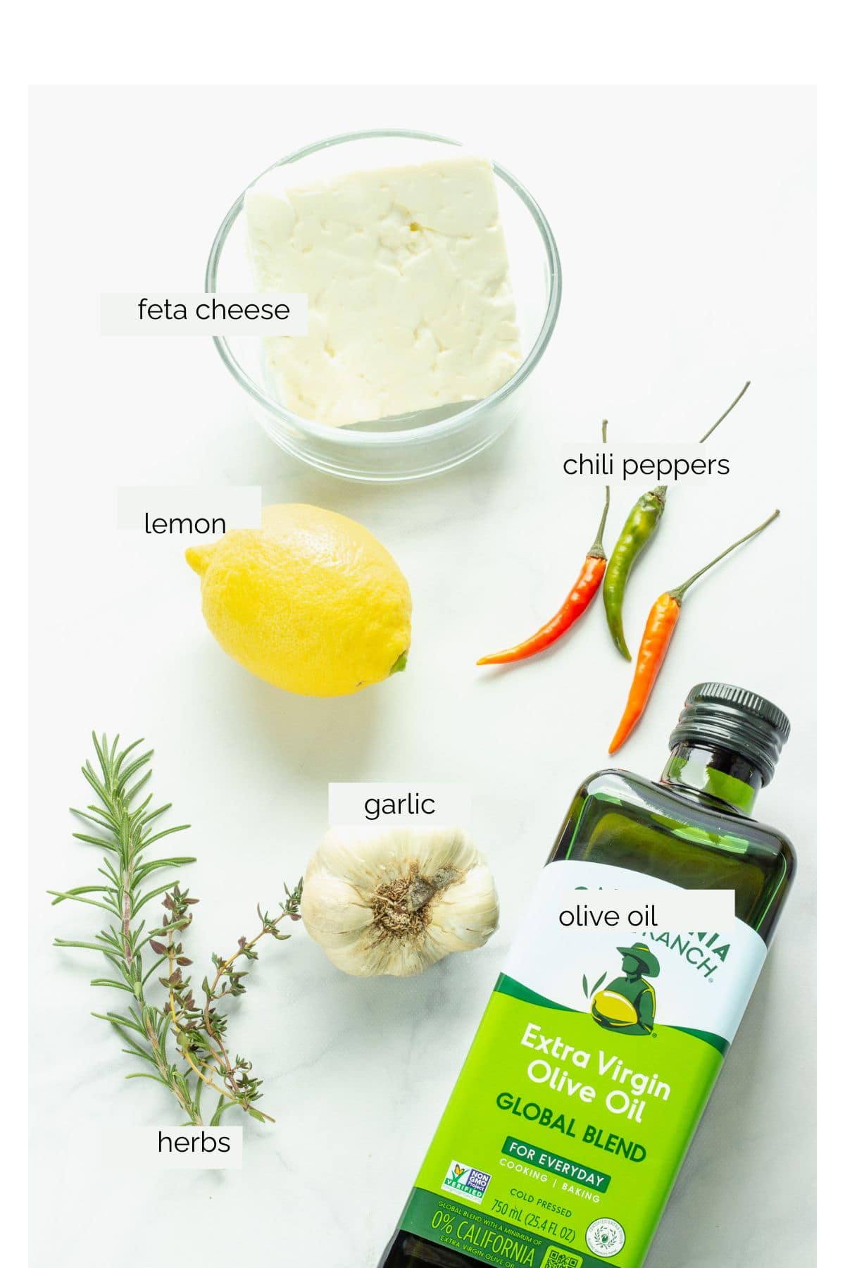 Ingredients needed to make marinated feta cheese.
